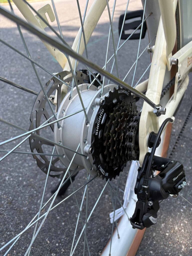 Beaumont Rev 3 rear hub motor, Shimano seven-speed drivetrain, and disc brake rotor