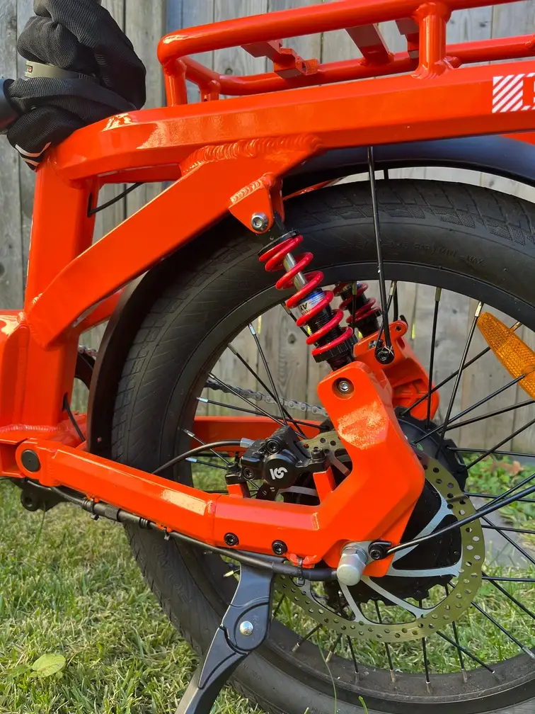Mooncool POP rear cargo rack and coil spring suspension